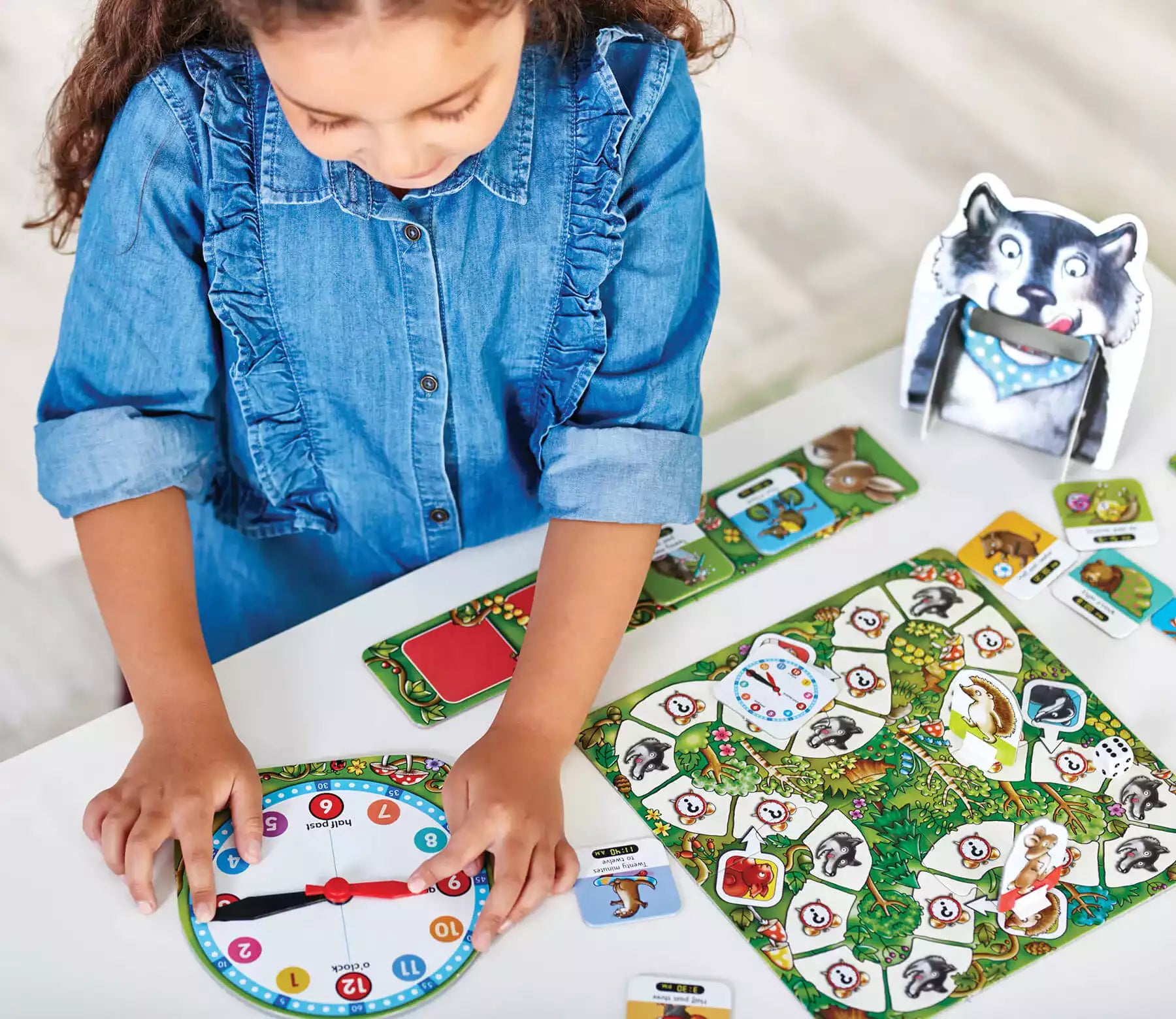 Setting time with What's the time Mr Wolf Orchard - board games for children