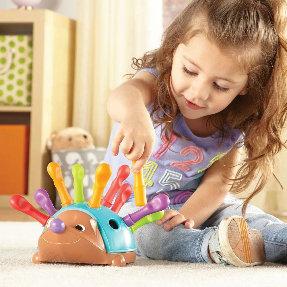 kids learning and playing with spike hedgehog - learning resources toys