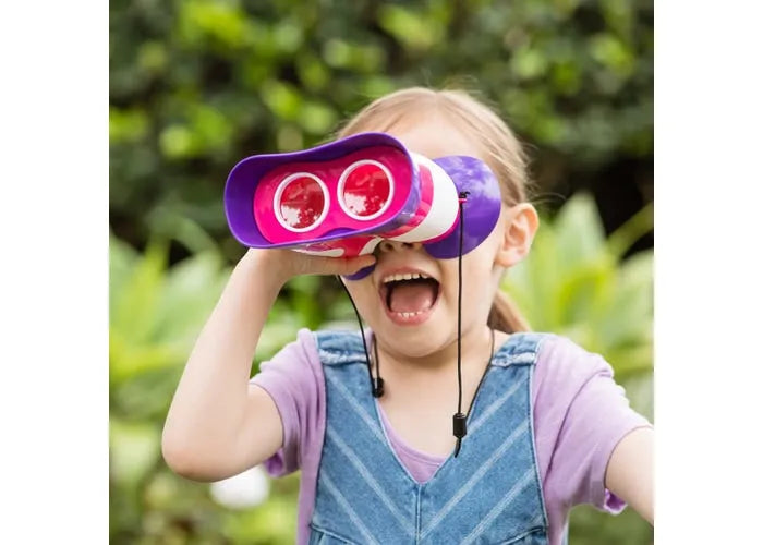 girl in outdoors with pink kidnoculars - learning resources toys