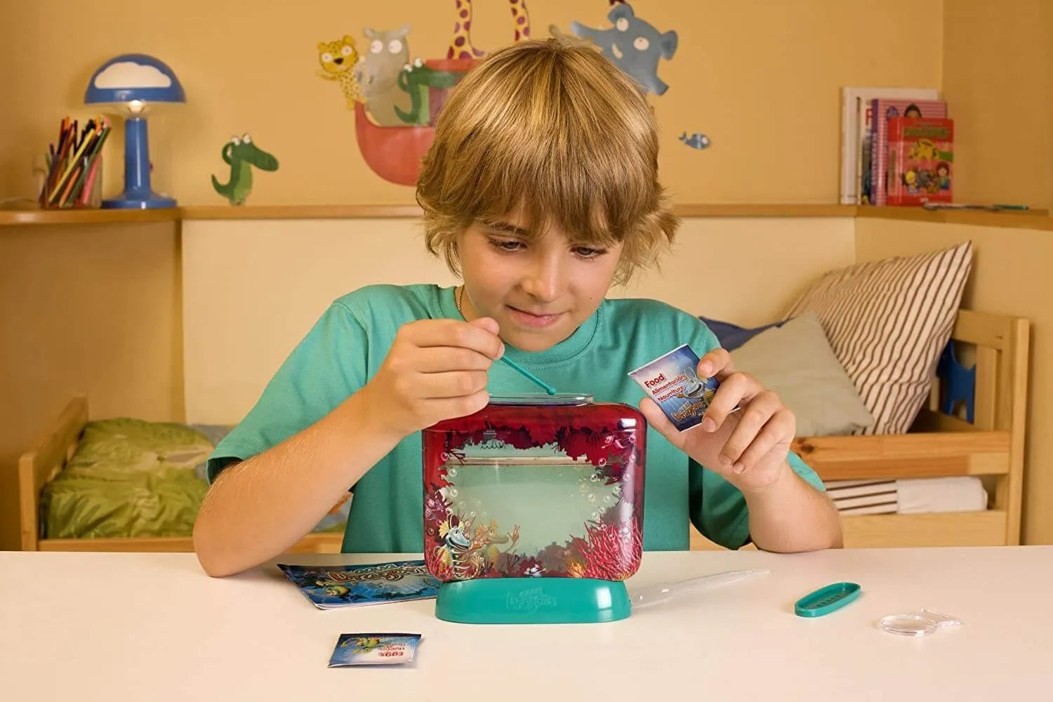 Boy playing with the Aqua Dragons science toy