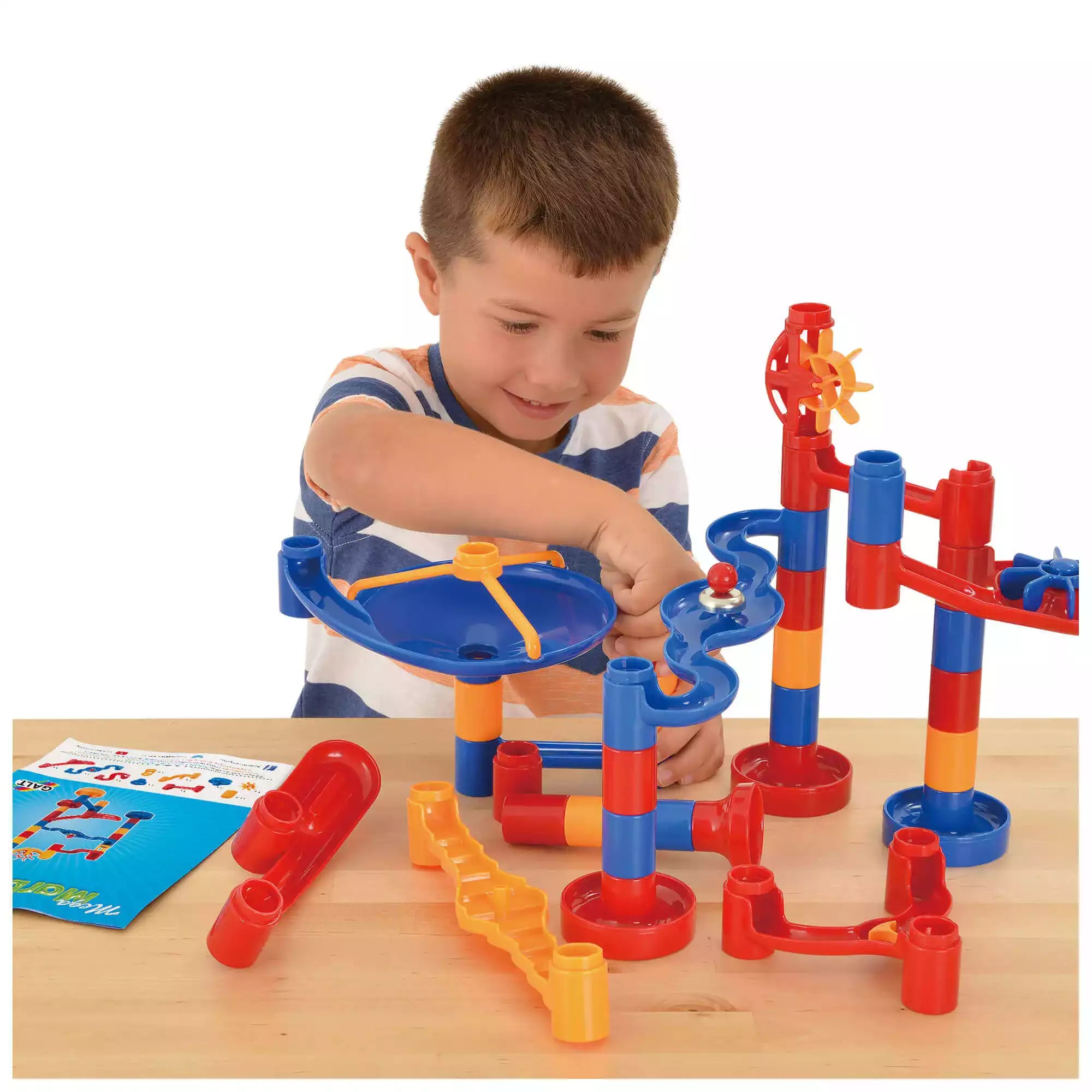 boy playing with mega marble run construction toy from galt toys