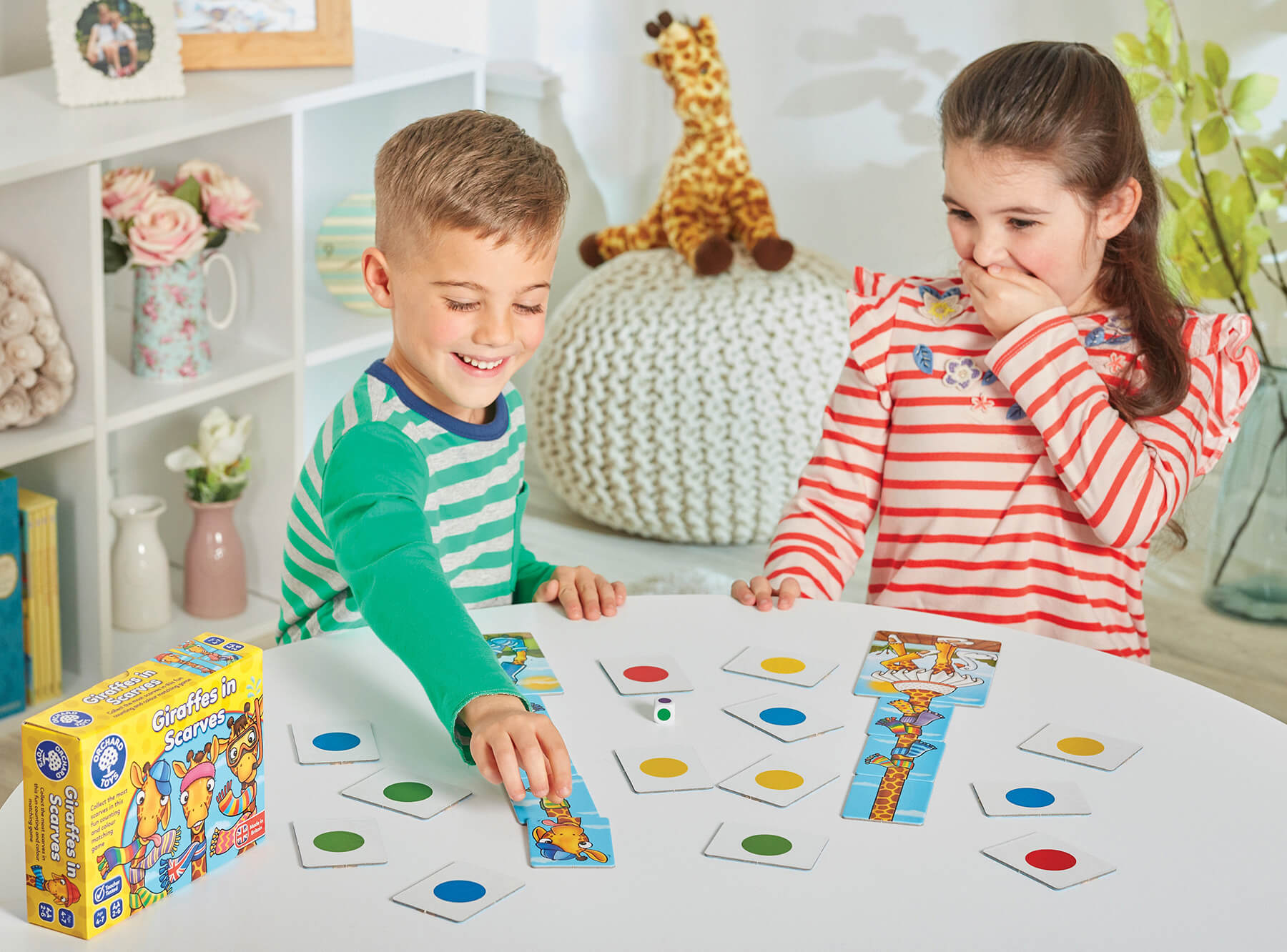 children playing with giraffe in scarves game