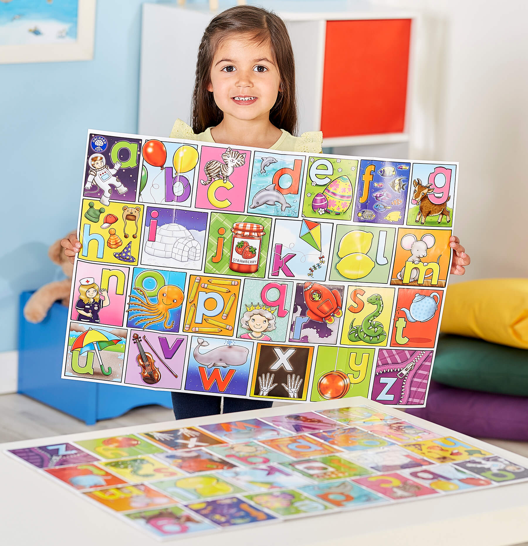 Girl with completed Big Alphabet Jigsaw Puzzle