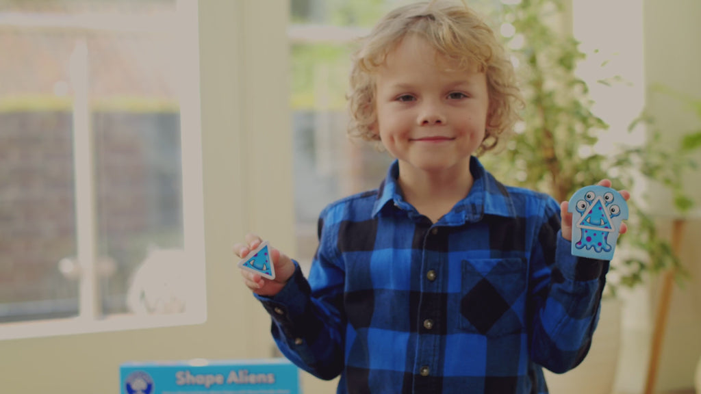  Children playing with Shape Aliens from orchard toys